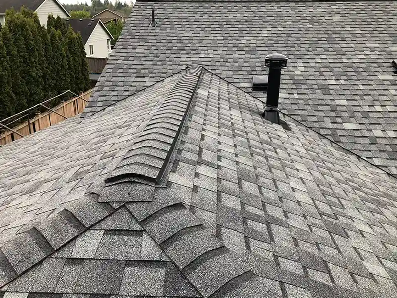 New gray shingles on residential roof